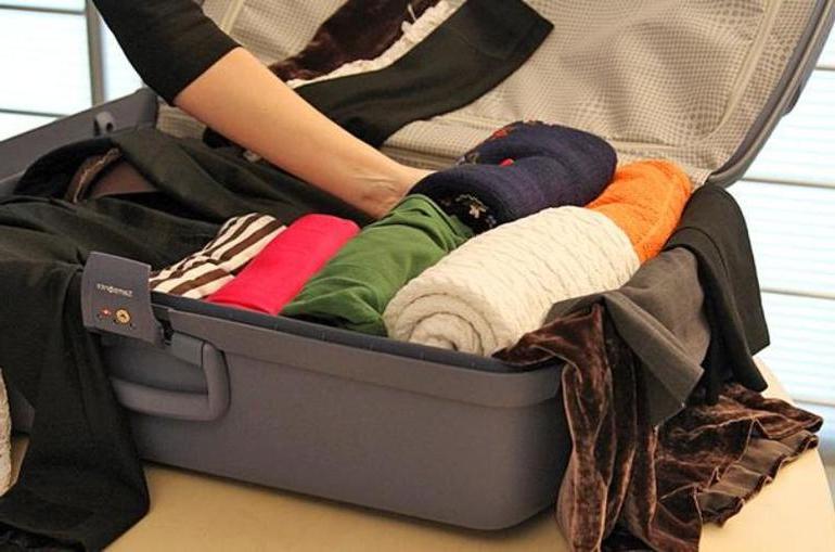 Как правильно паковать хрупкие предметы в чемодан